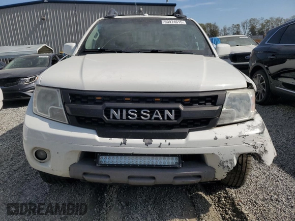 2015 Nissan Frontier Pro-4X with VIN 1N6AD0EV5FN700571, listed as a Copart auction lot 50974615 with 138,930 mi miles and Salvage title. Bid and sale history available at DreamBid. Image 5.