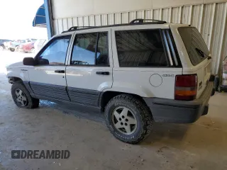 1995 Jeep Grand Cherokee Laredo with VIN 1J4GZ58Y0SC572757, listed as a Copart auction lot 52733375 with 160,588 mi miles and Salvage Title. Bid and sale history available at carsss.com. Image 2.