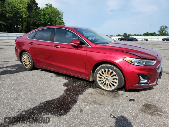 2019 Ford Fusion Titanium with VIN 3FA6P0D97KR225894, listed as a Copart auction lot 61340285 with 71,197 mi miles and Clean title. Bid and sale history available at DreamBid. Image 4.