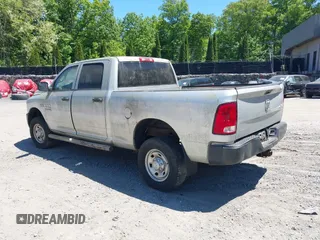 2014 Ram 2500 Tradesman z VIN 3C6TR5CT7EG186099, wystawiony jako IAAI lot #42317585 z przebiegiem 309 687 mil mil oraz . Historia ofert i sprzedaży dostępna na DreamBid. Obrazek 3.