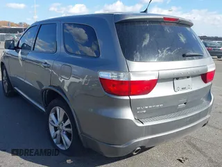 2011 Dodge Durango Heat with VIN 1D4RE3GG8BC733088, listed as a IAAI auction lot 40764161 with 149,846 mi miles. Bid and sale history available at carsss.com. Image 3.