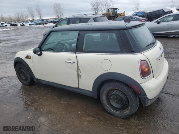 2009 MINI Cooper Hardtop with VIN WMWMF33599TU75504, listed as a Copart auction lot 47488215 with 275,606 mi miles and Salvage Title. Bid and sale history available at carsss.com. Image 2.