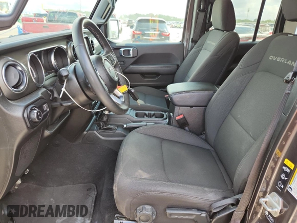 2023 Jeep Gladiator Overland with VIN 1C6HJTFG5PL560876, listed as a Copart auction lot 63239105 with 51,205 mi miles and Clean title. Bid and sale history available at DreamBid. Image 7.