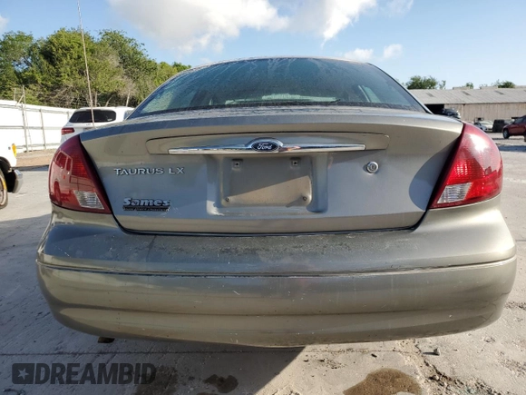 2003 Ford Taurus LX Standard with VIN 1FAFP52U13G243207, listed as a Copart auction lot 52763905 with 49,906 mi miles and Salvage title. Bid and sale history available at DreamBid. Image 6.