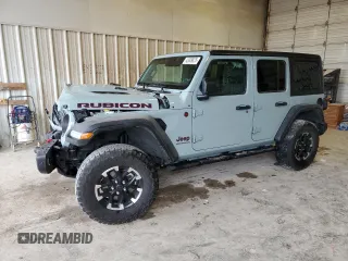 2024 Jeep Wrangler Rubicon with VIN 1C4PJXFG7RW287923, listed as a Copart auction lot 42609825 with 24,332 mi miles and Salvage Title. Bid and sale history available at DreamBid. Image 1.