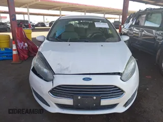 2014 Ford Fiesta SE with VIN 3FADP4EJ7EM111919, listed as a IAAI auction lot 42063116 with 154,137 mi miles and . Bid and sale history available at DreamBid. Image 12.