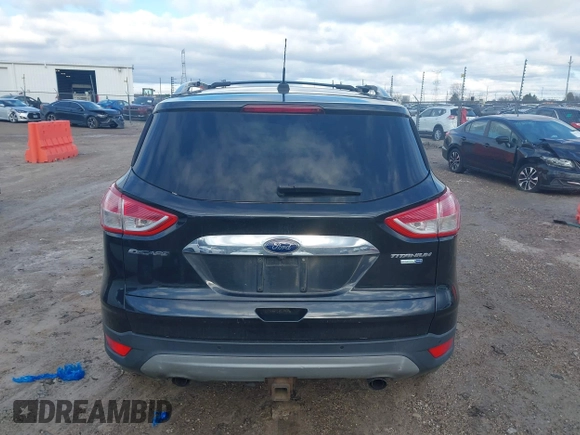 2015 Ford Escape Titanium with VIN 1FMCU9J96FUC11476, listed as a IAAI auction lot 41967914 with 149,341 mi miles. Bid and sale history available at carsss.com. Image 16.