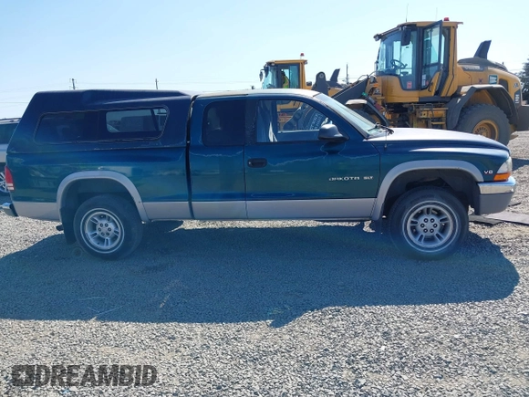 1999 Dodge Dakota SLT with VIN 1B7GG22Y2XS157214, listed as a IAAI auction lot 39776504 with 144,928 mi miles and . Bid and sale history available at carsss.com. Image 13.