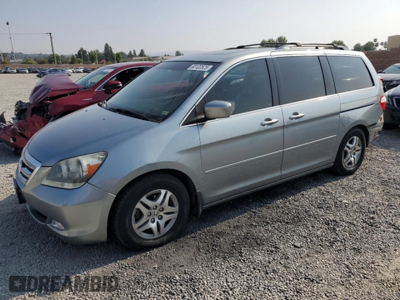 2006 Honda Odyssey EX-L z VIN 5FNRL38756B087695, wystawiony jako Copart lot #60122525 z przebiegiem 213 221 mil mil oraz Szkoda całkowita • Salvage title. Historia ofert i sprzedaży dostępna na DreamBid. Obrazek 1.