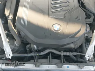 2021 BMW 7 Series 740i z VIN WBA7T2C03MCE56494, wystawiony jako IAAI lot #42594295 z przebiegiem 68 359 mil mil oraz . Historia ofert i sprzedaży dostępna na DreamBid. Obrazek 22.