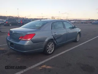 2010 Toyota Avalon XL with VIN 4T1BK3DB1AU363817, listed as a IAAI auction lot 41010053 with 259,106 mi miles and . Bid and sale history available at carsss.com. Image 4.