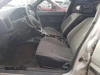 1992 Toyota Corolla z VIN 1NXAE91A1NZ346555, wystawiony jako Copart lot #37697334 z przebiegiem 232 988 mil mil oraz Szkoda całkowita • Salvage title. Historia ofert i sprzedaży dostępna na DreamBid. Obrazek 7.