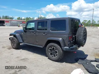 2017 Jeep Wrangler Unlimited Rubicon Recon with VIN 1C4HJWFG2HL560846, listed as a IAAI auction lot 42532745 with 101,285 mi miles and . Bid and sale history available at DreamBid. Image 3.