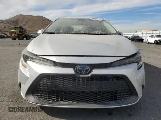 2020 Toyota Corolla Hybrid LE with VIN JTDEBRBE7LJ029233, listed as a Copart auction lot 43476165 with 118,385 mi miles and Salvage Title. Bid and sale history available at carsss.com. Image 5.