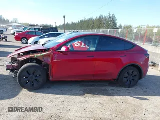 2024 Tesla Model Y Long Range with VIN 7SAYGDEE9RF199805, listed as a IAAI auction lot 42018221 with 7,359 mi miles. Bid and sale history available at carsss.com. Image 15.