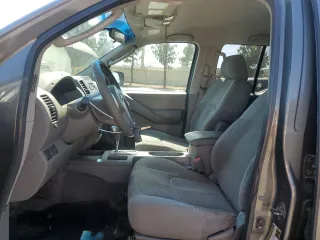 2009 Nissan Frontier LE with VIN 1N6AD09UX9C416211, listed as a Copart auction lot 61655315 with 344,390 mi miles and Salvage title. Bid and sale history available at DreamBid. Image 7.
