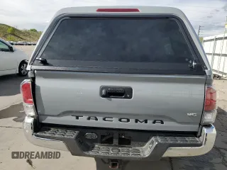 2020 Toyota Tacoma SR5 with VIN 3TMDZ5BN6LM097302, listed as a Copart auction lot 57503895 with 77,212 mi miles and Salvage title. Bid and sale history available at DreamBid. Image 6.