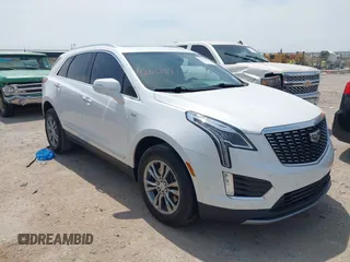 2021 Cadillac XT5 FWD Premium Luxury z VIN 1GYKNCR42MZ174309, wystawiony jako IAAI lot #42051341 z przebiegiem 75 544 mil mil oraz . Historia ofert i sprzedaży dostępna na DreamBid. Obrazek 1.