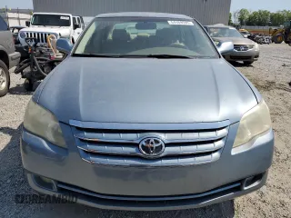 2005 Toyota Avalon XL z VIN 4T1BK36B95U005898, wystawiony jako Copart lot #54469595 z przebiegiem 176 901 mil mil oraz Szkoda całkowita • Salvage title. Historia ofert i sprzedaży dostępna na DreamBid. Obrazek 5.