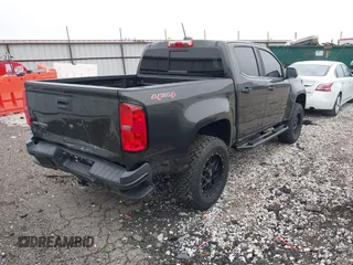 2018 Chevrolet Colorado 4WD LT z VIN 1GCGTCEN2J1235085, wystawiony jako IAAI lot #42192629 z przebiegiem 83 914 mil mil oraz . Historia ofert i sprzedaży dostępna na DreamBid. Obrazek 4.
