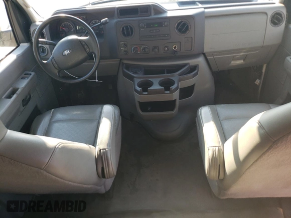 2010 Ford Econoline Passenger XL with VIN 1FMNE1BW2ADA11991, listed as a Copart auction lot 63758014 with 32,785 mi miles and Salvage Title. Bid and sale history available at DreamBid. Image 8.