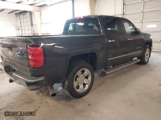 2014 Chevrolet Silverado 1500 LTZ with VIN 3GCUKSEC8EG257629, listed as a IAAI auction lot 41415515 with 167,904 mi miles. Bid and sale history available at carsss.com. Image 4.