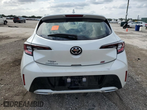 2020 Toyota Corolla Hatchback SE with VIN JTND4RBE2L3088079, listed as a Copart auction lot 75100054 with 27,730 mi miles and Salvage Title. Bid and sale history available at carsss.com. Image 6.