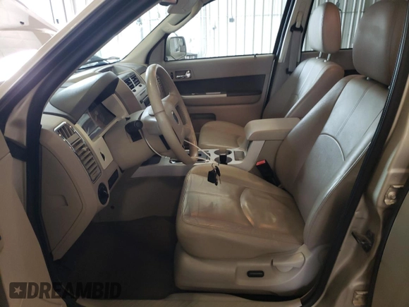 2011 Mercury Mariner Premier z VIN 4M2CN9HG9BKJ06775, wystawiony jako Copart lot #59256315 z przebiegiem 186 694 mil mil oraz Szkoda całkowita • Salvage title. Historia ofert i sprzedaży dostępna na DreamBid. Obrazek 7.