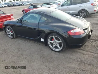 2008 Porsche Cayman S Design Edition с VIN WP0AB29898U782418, выставлен на аукционе Copart как лот 75901254 с пробегом Не указан миль и Списание • Salvage title. История ставок и продаж доступна на DreamBid. Изображение 2.