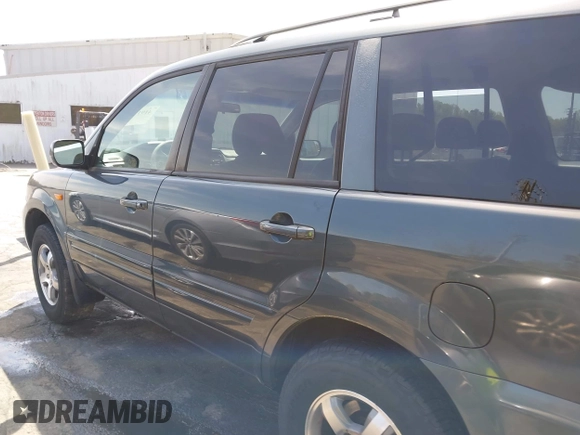 2006 Honda Pilot EX with VIN 2HKYF18416H529290, listed as a IAAI auction lot 41915915 with 135,385 mi miles and . Bid and sale history available at DreamBid. Image 14.