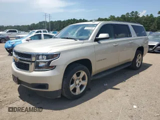 2017 Chevrolet Suburban LT with VIN 1GNSCHKCXHR296021, listed as a Copart auction lot 61767585 with 211,282 mi miles and Salvage title. Bid and sale history available at DreamBid. Image 1.