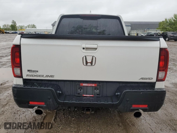 2023 Honda Ridgeline RTL-E with VIN 5FPYK3F78PB015187, listed as a Copart auction lot 57655465 with 57,704 mi miles and Salvage title. Bid and sale history available at DreamBid. Image 6.