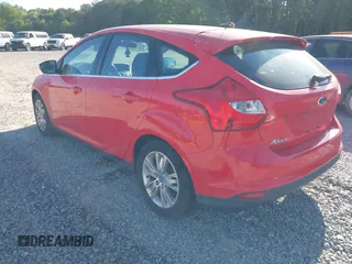 2012 Ford Focus SEL with VIN 1FAHP3M20CL393440, listed as a IAAI auction lot 42015692 with 198,214 mi miles. Bid and sale history available at carsss.com. Image 3.