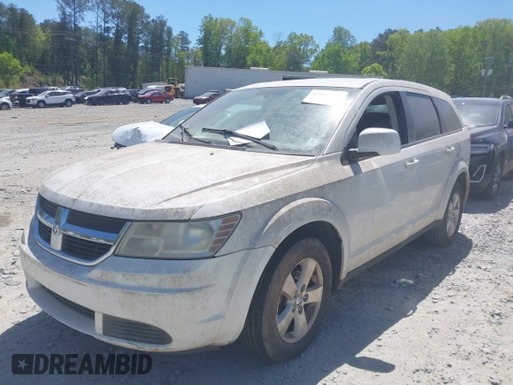 2009 Dodge Journey SXT with VIN 3D4GG57VX9T200489, listed as a IAAI auction lot 42048965 with 156,830 mi miles. Bid and sale history available at carsss.com. Image 2.