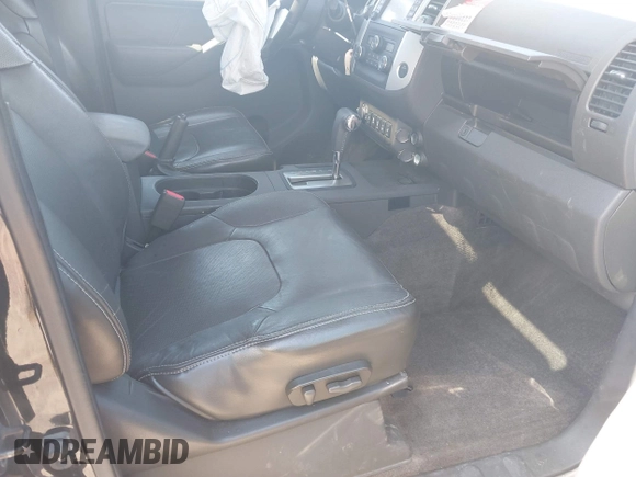 2014 Nissan Frontier SV with VIN 1N6AD0EV0EN758585, listed as a IAAI auction lot 41943169 with 186,214 mi miles and . Bid and sale history available at DreamBid. Image 5.