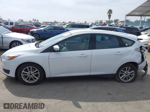 2015 Ford Focus SE with VIN 1FADP3K22FL315960, listed as a IAAI auction lot 41968426 with 184,726 mi miles. Bid and sale history available at carsss.com. Image 14.