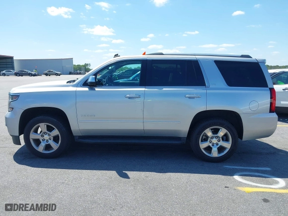 2015 Chevrolet Tahoe LTZ with VIN 1GNSCCKC3FR202934, listed as a IAAI auction lot 41995474 with 258,186 mi miles. Bid and sale history available at carsss.com. Image 14.
