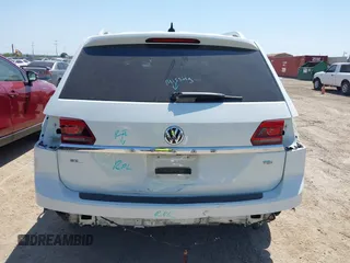 2018 Volkswagen Atlas SE with VIN 1V2CP2CA6JC595282, listed as a IAAI auction lot 42227930 with 95,799 mi miles and . Bid and sale history available at DreamBid. Image 6.