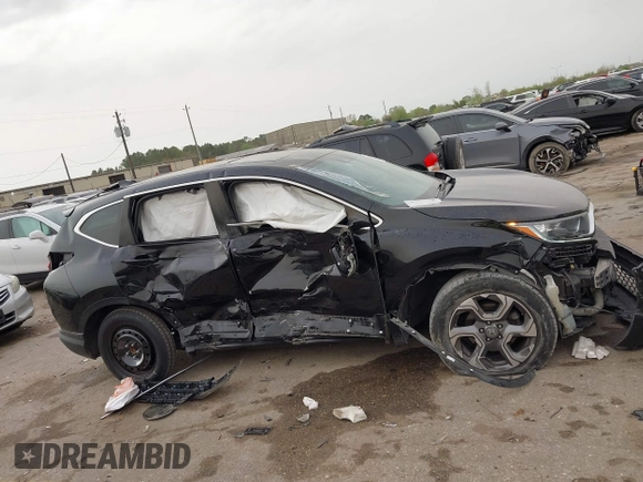 2019 Honda CR-V EX with VIN 5J6RW1H54KA039693, listed as a IAAI auction lot 41827425 with 100,371 mi miles. Bid and sale history available at carsss.com. Image 13.