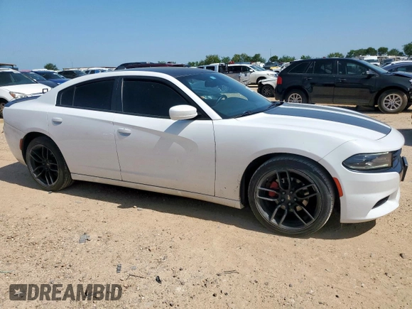 2015 Dodge Charger SXT with VIN 2C3CDXHG0FH862901, listed as a Copart auction lot 61402225 with 128,926 mi miles and Salvage title. Bid and sale history available at DreamBid. Image 4.
