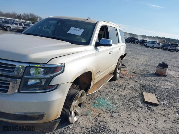 2015 Chevrolet Tahoe LTZ with VIN 1GNSCCKCXFR287609, listed as a IAAI auction lot 41688936 with 112,678 mi miles. Bid and sale history available at carsss.com. Image 6.