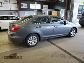 2012 Honda Civic LX z VIN 2HGFB2F59CH313357, wystawiony jako Copart lot #59526905 z przebiegiem 253 322 mil mil oraz Czysty tytuł • Clean title. Historia ofert i sprzedaży dostępna na DreamBid. Obrazek 3.