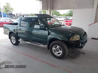 2001 Nissan Frontier SE z VIN 1N6ED27T51C370931, wystawiony jako IAAI lot #42197757 z przebiegiem 149 710 mil mil oraz . Historia ofert i sprzedaży dostępna na DreamBid. Obrazek 1.
