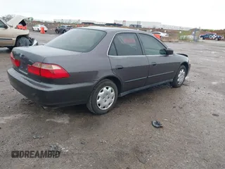 1999 Honda Accord LX with VIN 1HGCG5647XA154131, listed as a IAAI auction lot 41962701 with 126,673 mi miles and . Bid and sale history available at DreamBid. Image 4.