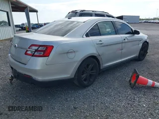 2015 Ford Taurus SEL with VIN 1FAHP2E95FG209483, listed as a IAAI auction lot 41920846 with 138,673 mi miles and . Bid and sale history available at DreamBid. Image 4.