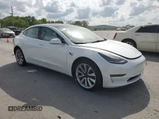2019 Tesla Model 3 Mid Range z VIN 5YJ3E1EA5KF480188, wystawiony jako Copart lot #53817545 z przebiegiem 121 846 mil mil oraz Szkoda całkowita • Salvage title. Historia ofert i sprzedaży dostępna na DreamBid. Obrazek 4.