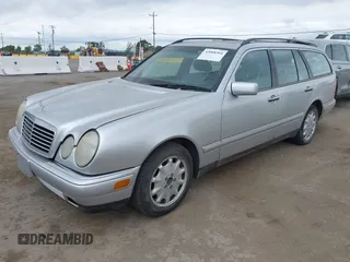 1999 Mercedes-Benz E-Class with VIN WDBJH65F5XA721205, listed as a IAAI auction lot 42068204 with 183,421 mi miles. Bid and sale history available at carsss.com. Image 2.
