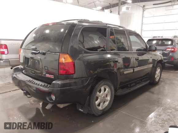 2005 GMC Envoy SLT z VIN 1GKDT13S852281122, wystawiony jako IAAI lot #42292577 z przebiegiem 156 052 mil mil oraz . Historia ofert i sprzedaży dostępna na DreamBid. Obrazek 4.