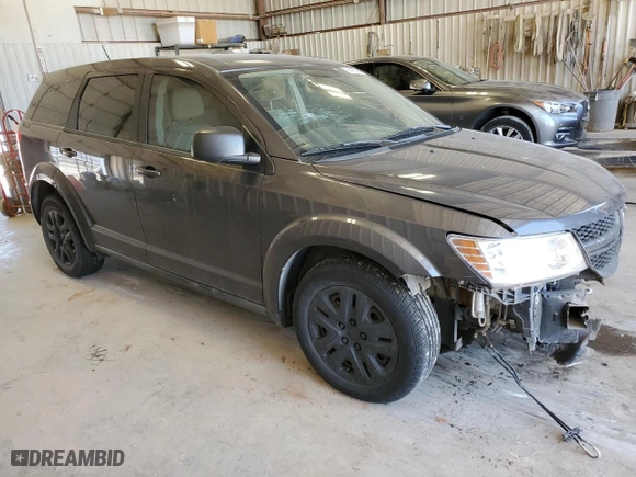 2014 Dodge Journey SE with VIN 3C4PDCAB1ET259000, listed as a Copart auction lot 61473764 with 31,428 mi miles and Salvage Title. Bid and sale history available at carsss.com. Image 4.