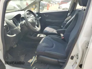 2013 Honda Fit Sport с VIN JHMGE8H54DC072949, выставлен на аукционе Copart как лот 57798645 с пробегом 45 886 миль миль и Списание • Salvage title. История ставок и продаж доступна на DreamBid. Изображение 7.
